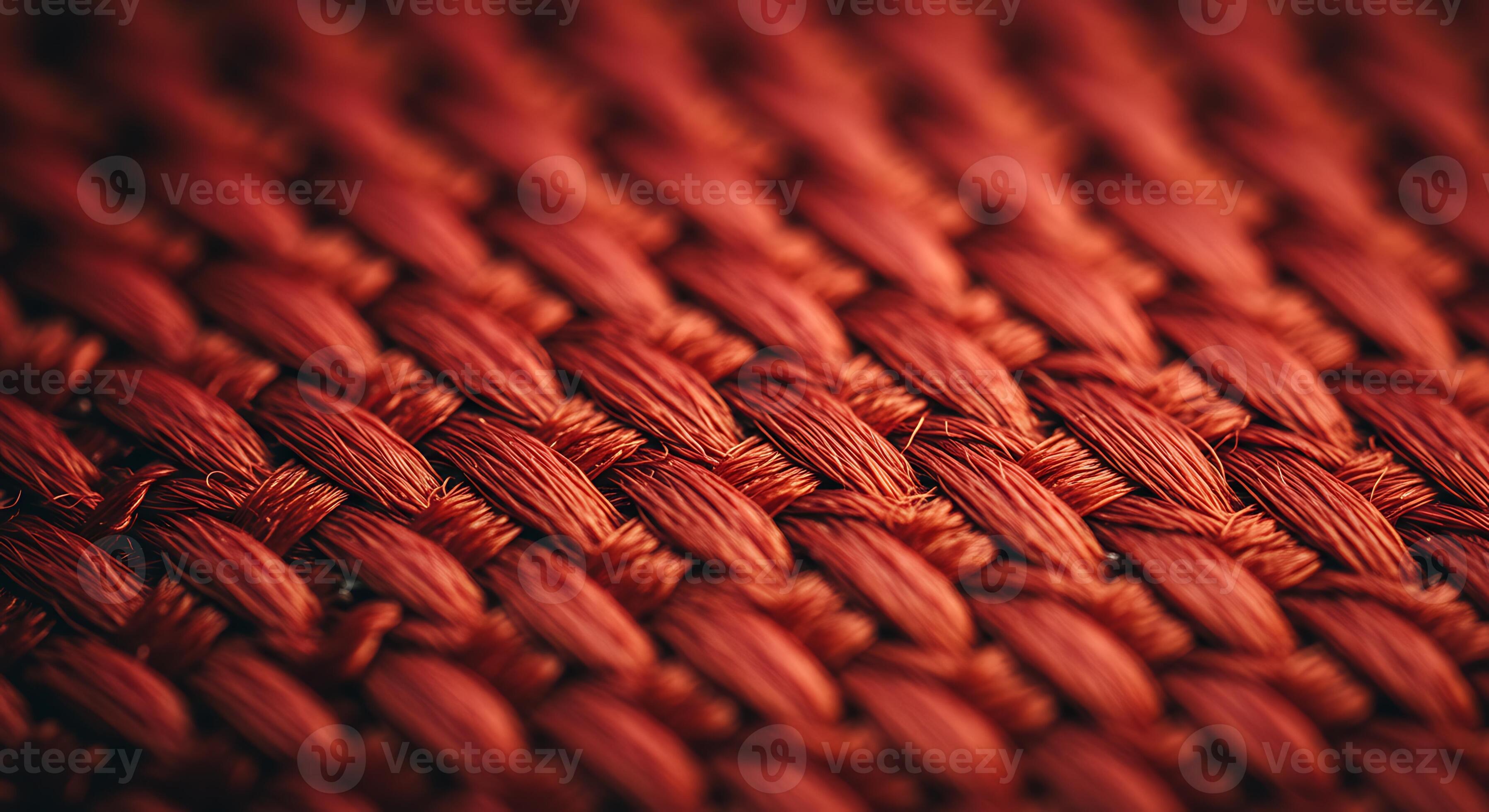 A close-up photograph of a woven upholstery fabric showing a clear over-under texture pattern in warm natural light