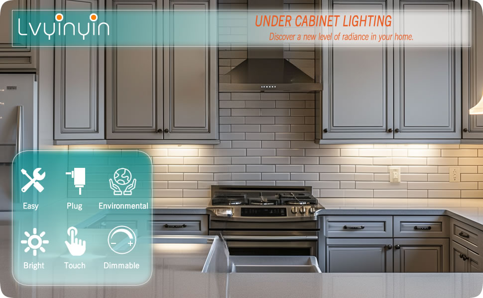 A real kitchen showing an under-cabinet LED strip with a small touch dimmer switch mounted near the front edge of the cabinet, softly lit countertop below