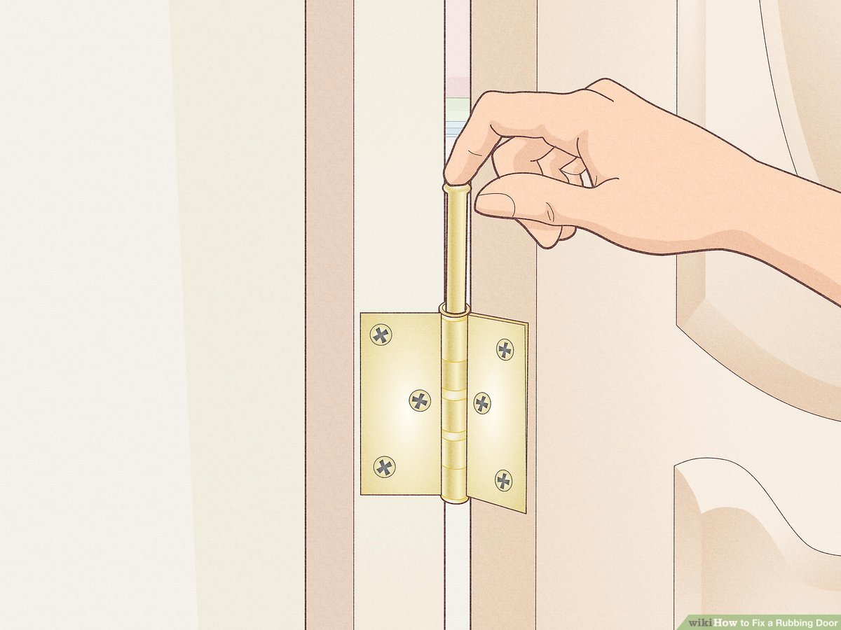 A real photo close-up of an interior door hinge area where the door edge is rubbing the painted frame, with a screwdriver tightening the hinge screws