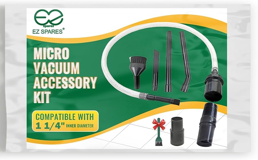 A real photo of a handheld vacuum using a crevice tool to clean crumbs from the seams and creases of a fabric office chair seat, close-up detail