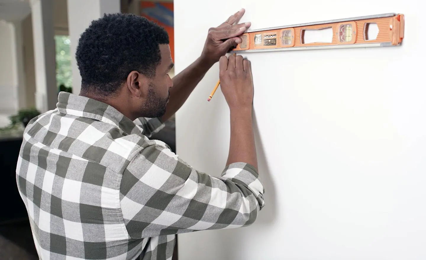 Hang Heavy Mirrors and Art in a Rental Without Wall Damage