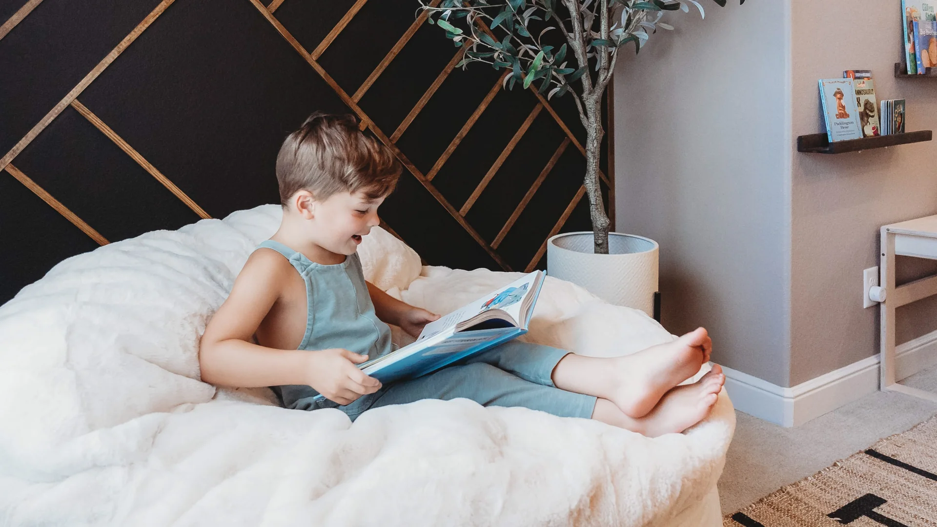 A removable linen bean bag cover draped over a drying rack near a sunny window, soft natural light and a calm home interior