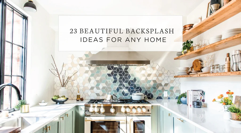 Several large white paint samples taped to a kitchen wall next to a tiled backsplash and a stone countertop, photographed in natural daylight